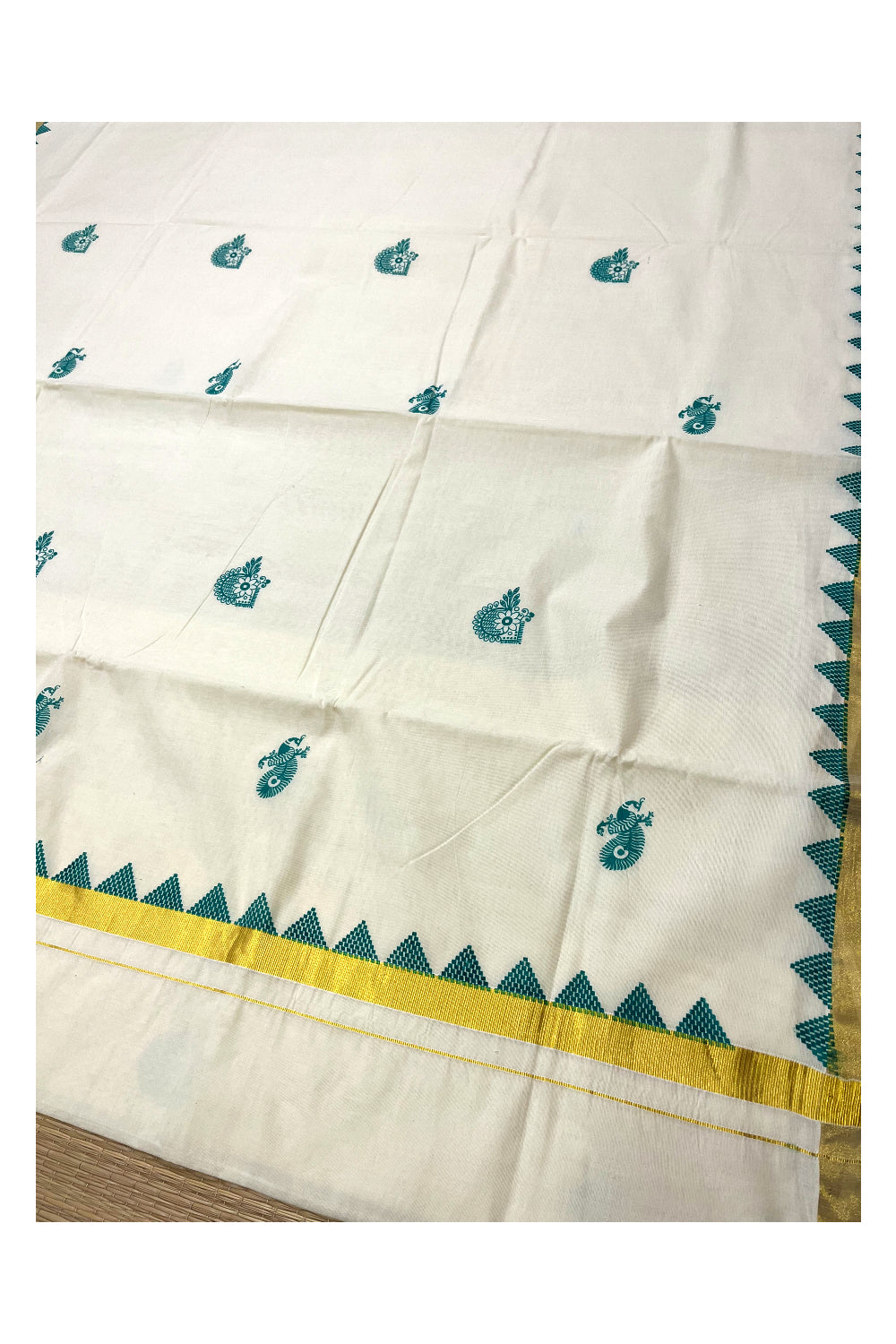 Pure Cotton Kerala Kasavu Saree with Green Temple Border Pallu and Peacock Block Prints on Body