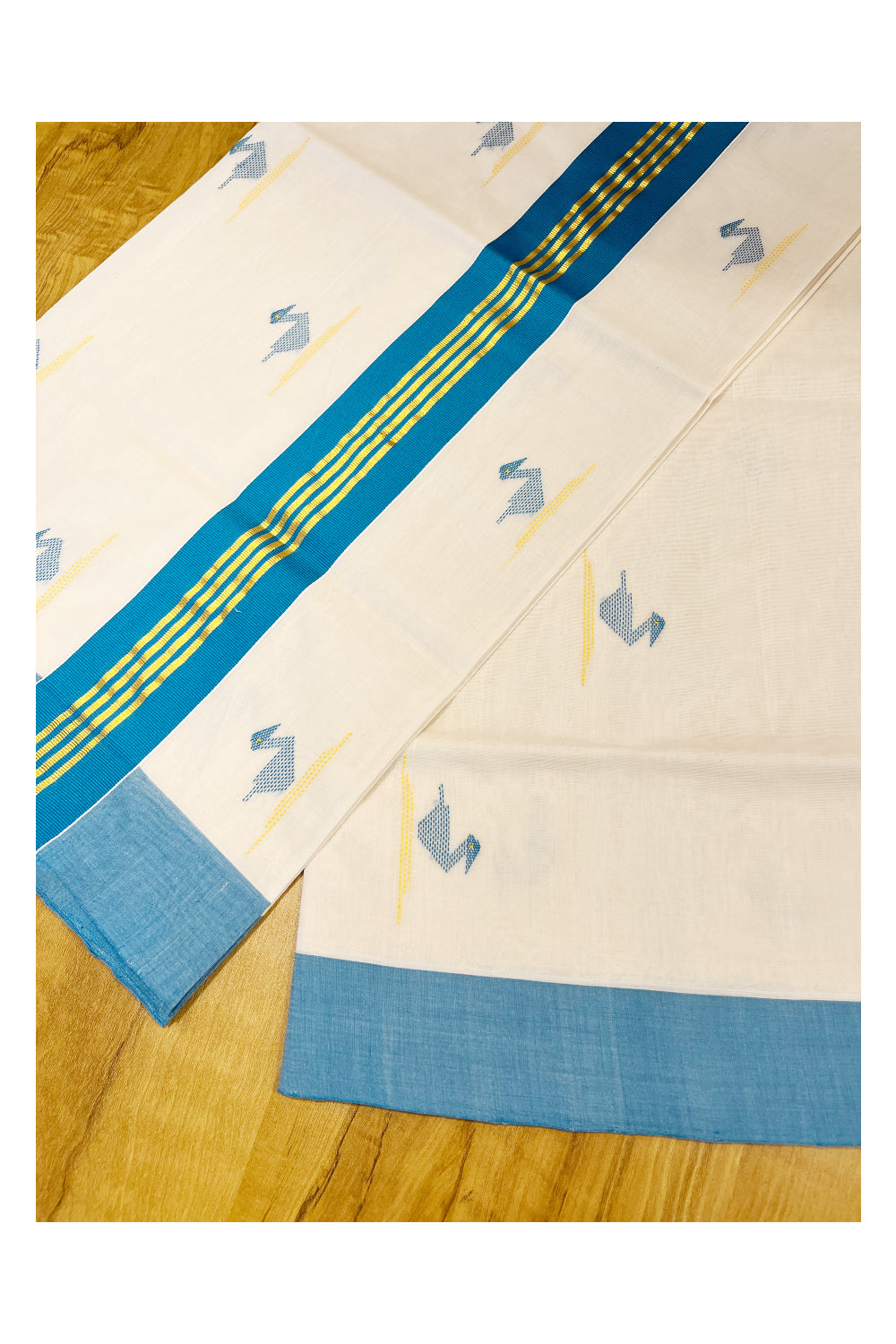 Southloom Premium Balaramapuram Unakkupaavu Handloom Cotton Butta Saree with Kasavu and Peacock Blue Border