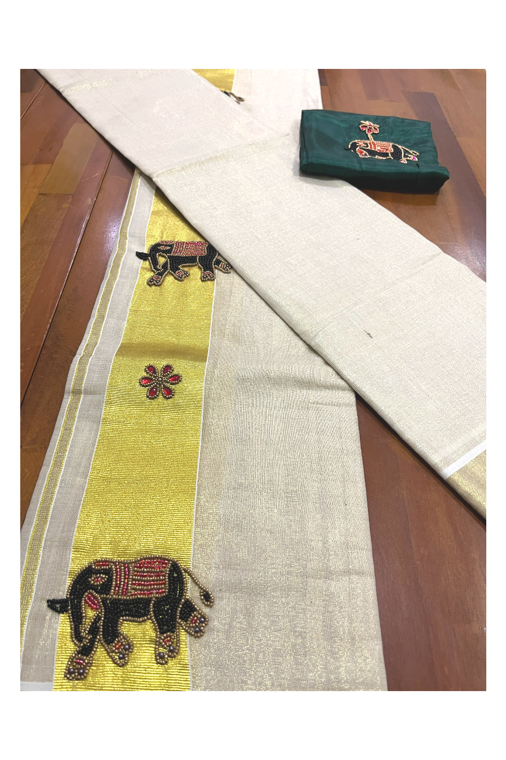 Kerala Tissue Kasavu Set Mundu (Mundum Neriyathum) with Elephant Bead Handwork Design and Dark Green Blouse Piece