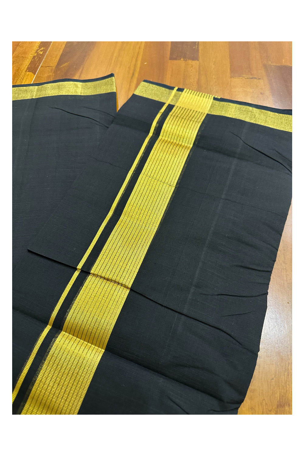 Southloom Balaramapuram Unakkupaavu Handloom Black Mundu with Kasavu Lines Border