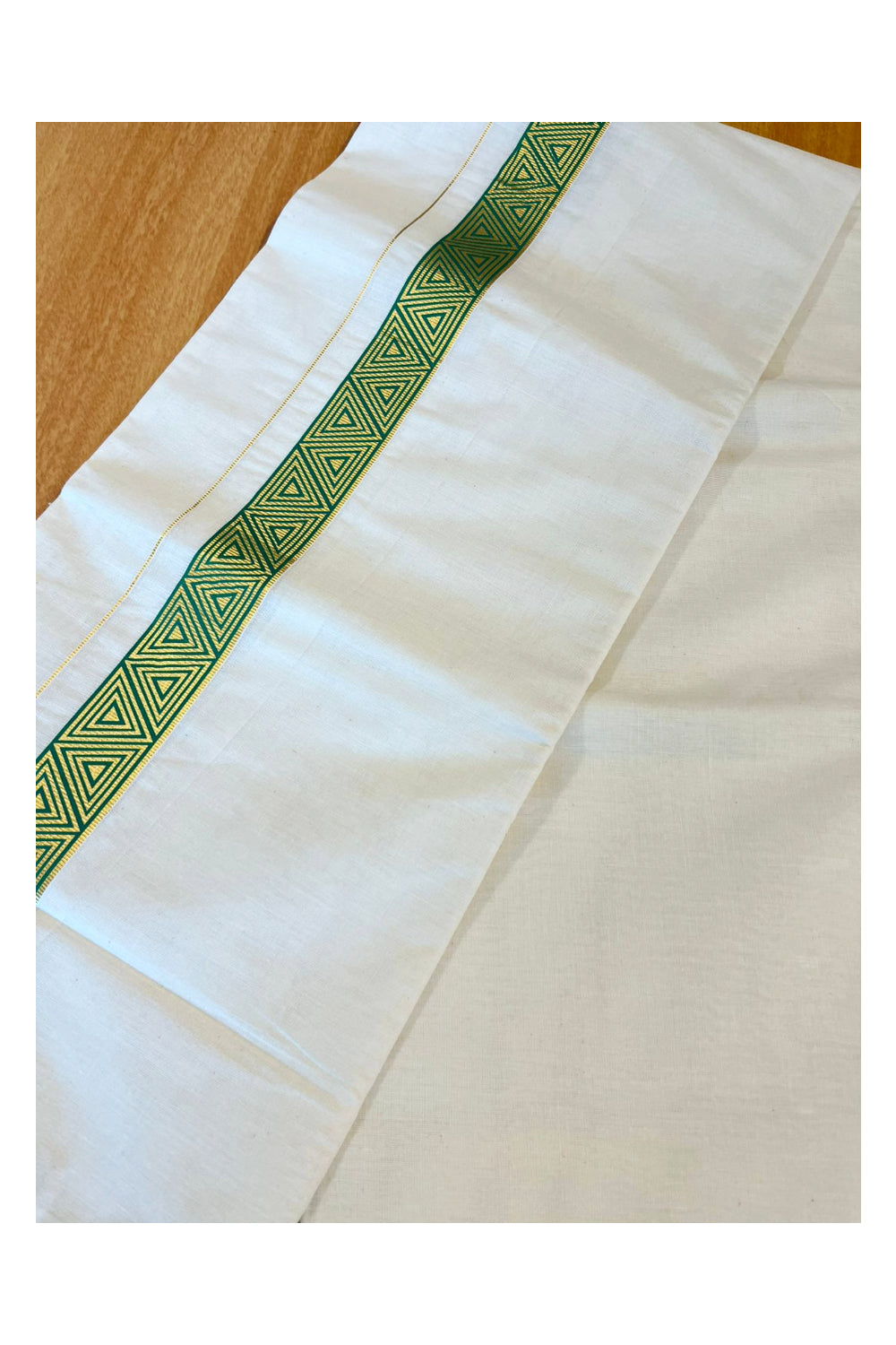 Southloom Kasavu Double Mundu with Green Prints Along Kasavu Kara