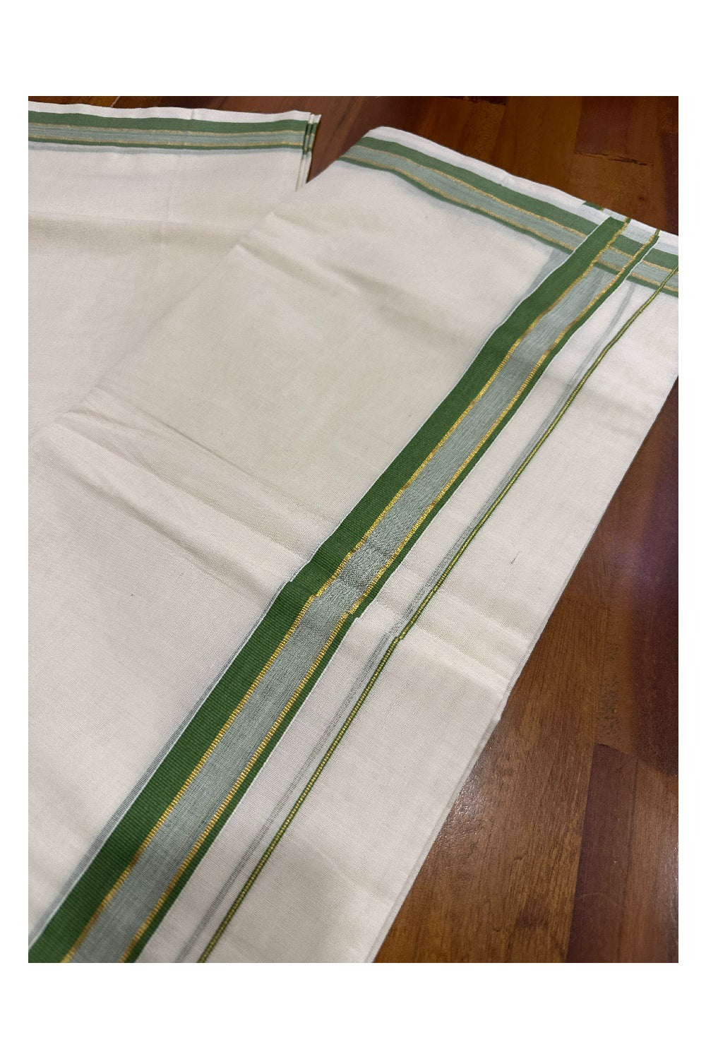 Southloom Premium Handloom Mundu with Green and Kasavu Kara (Onam Mundu 2023)