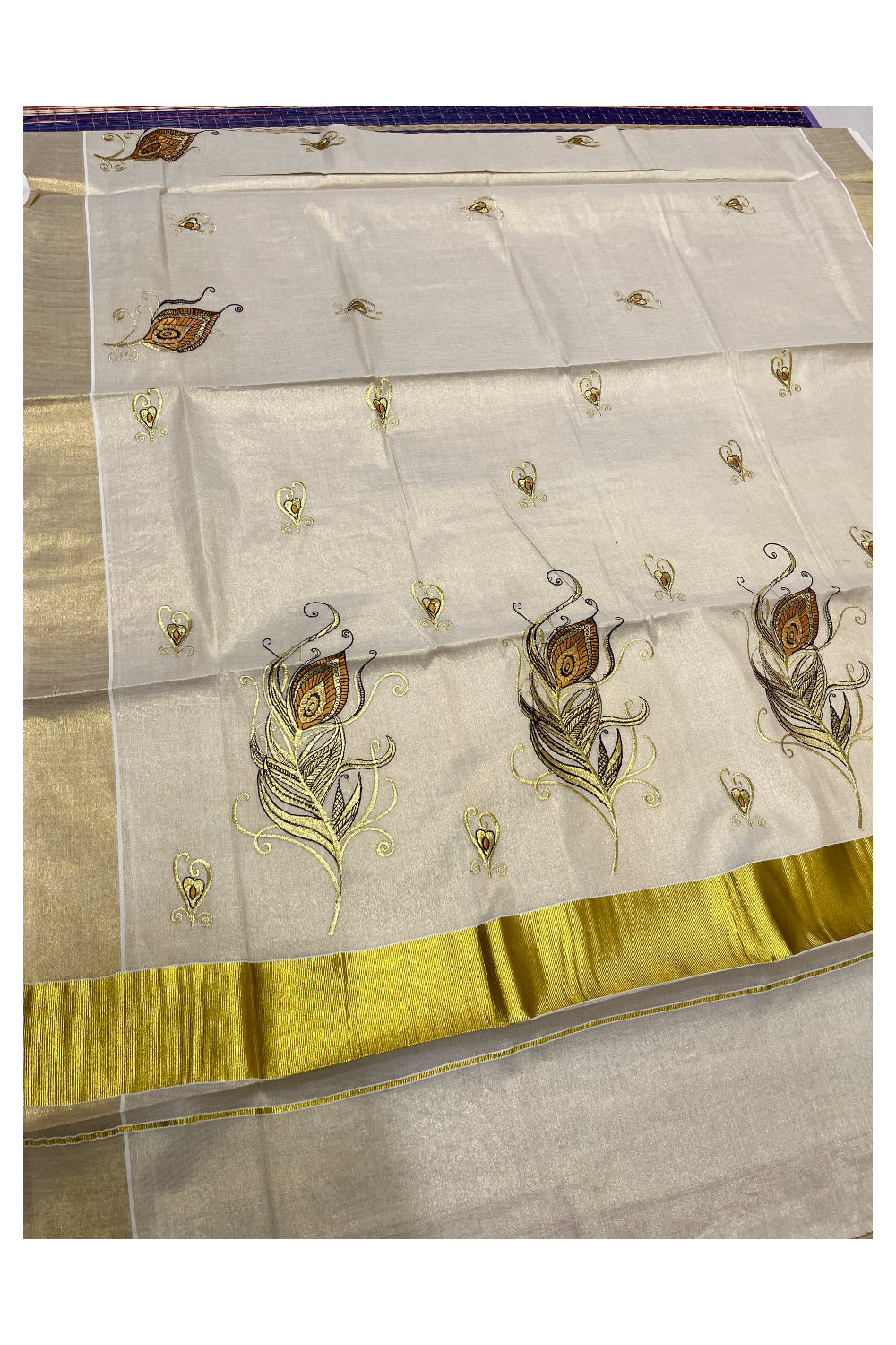 Kerala Tissue Orange and Golden Feather Embroidery Work Kasavu Saree (Vishu 2024 Collection)