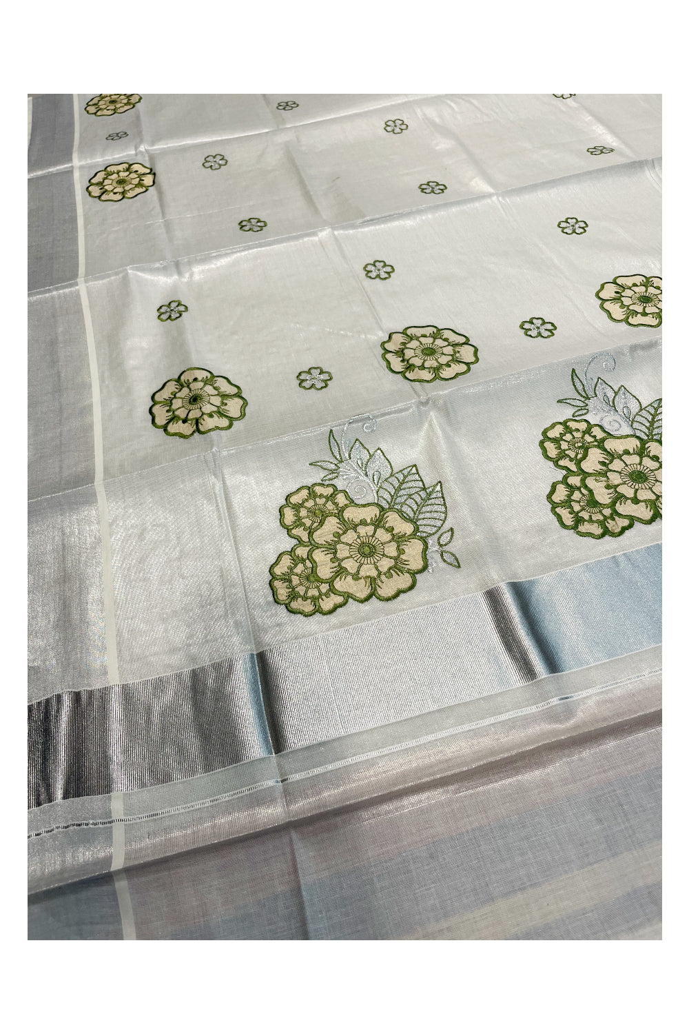 Southloom Kerala Siver Tissue Saree with Green Flower Embroidery Work