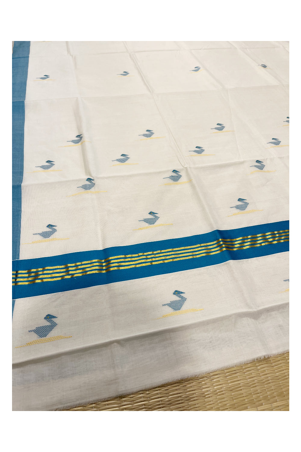 Southloom Premium Balaramapuram Unakkupaavu Handloom Cotton Butta Saree with Kasavu and Peacock Blue Border