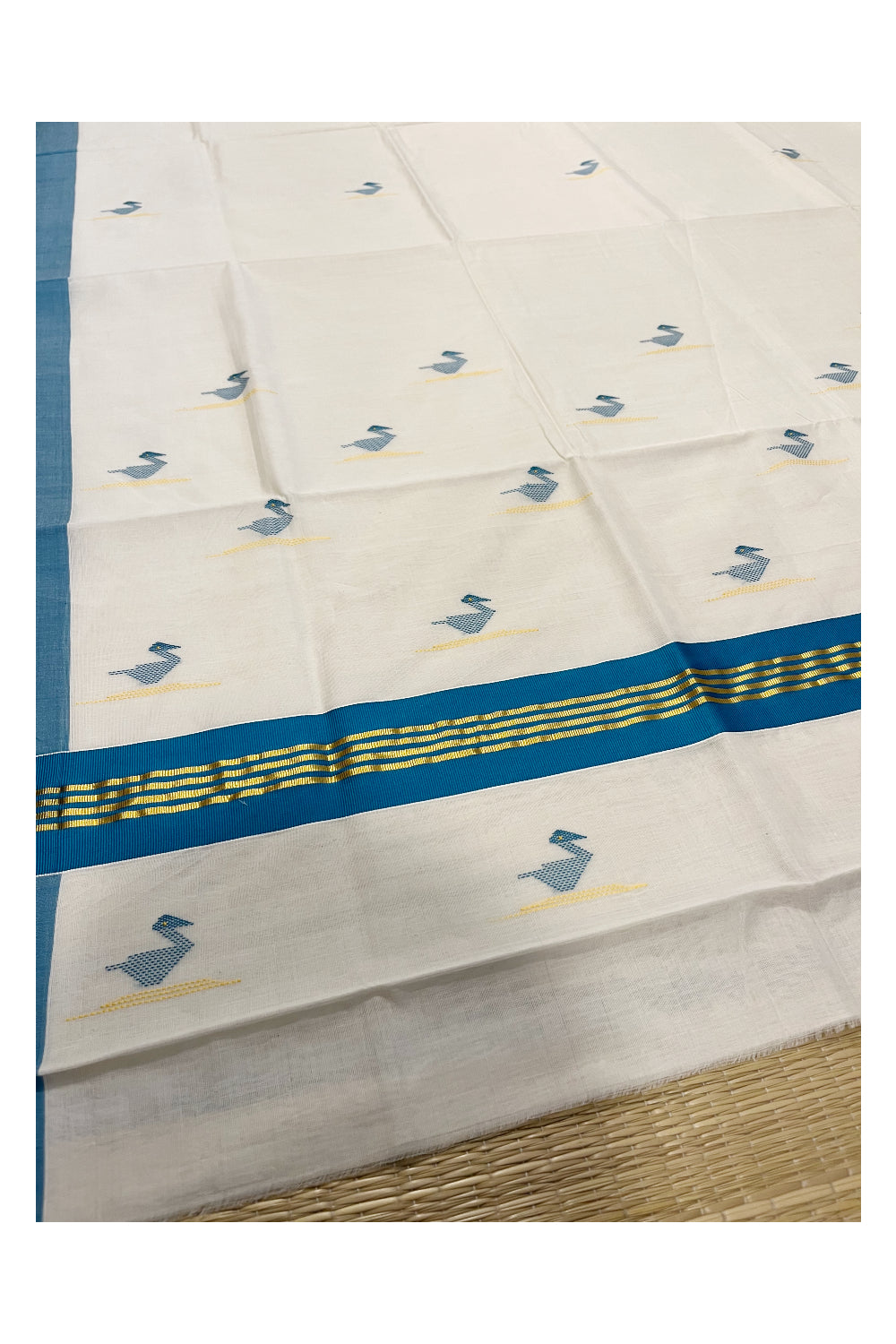 Southloom Premium Balaramapuram Unakkupaavu Handloom Cotton Butta Saree with Kasavu and Peacock Blue Border