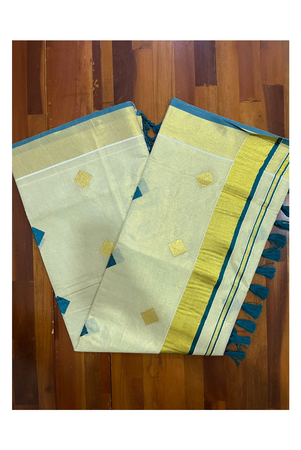 Kerala Tissue Kasavu Saree with Green Woven Butta Designs and Tassels Works