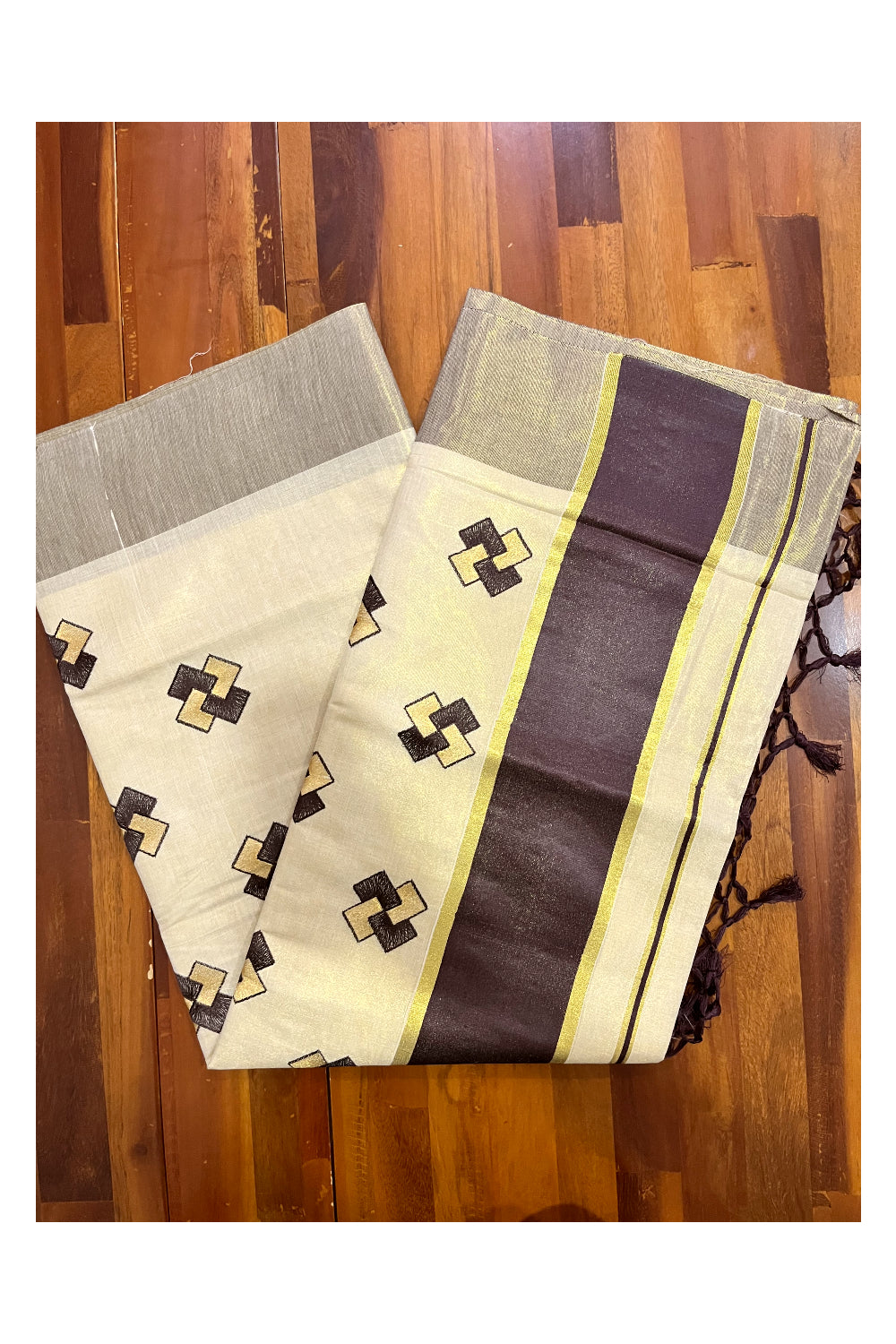 Kerala Tissue Kasavu Saree With Brown Border and Embroidered Designs on Body