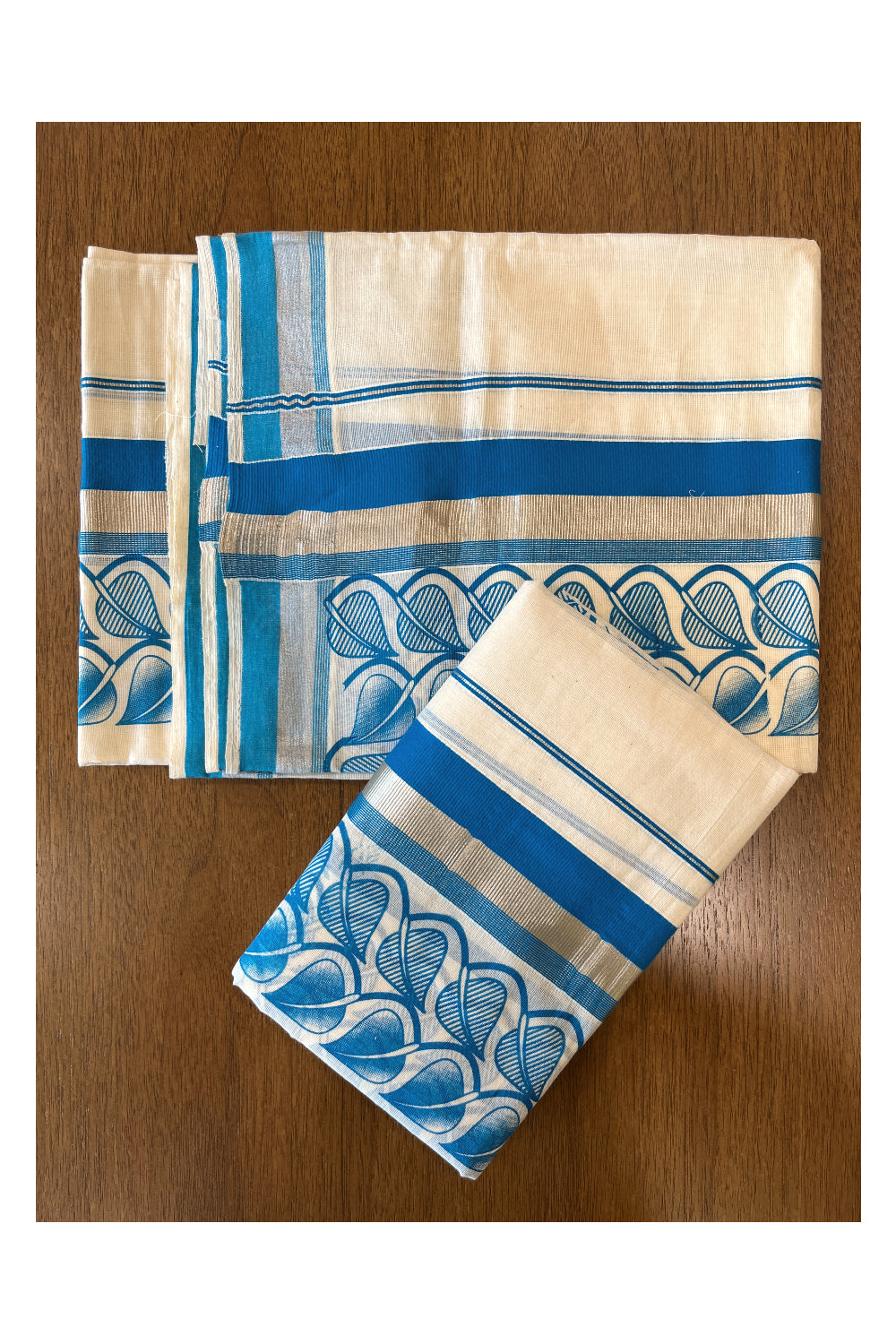 Cotton Single Set Mundu (Mundu Neriyathum) with Block Prints on Silver Kasavu and Blue Border