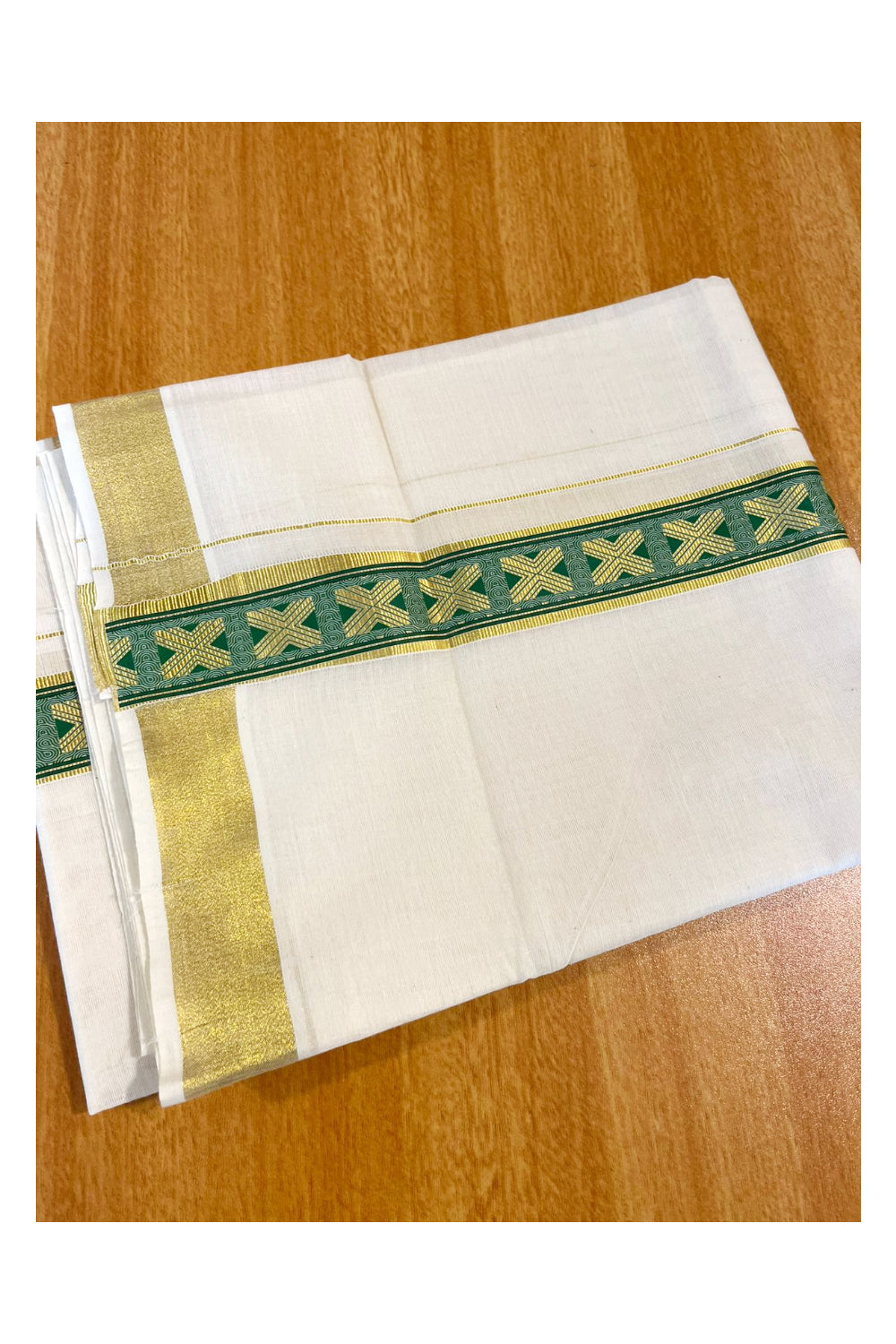 Southloom Kasavu Double Mundu with Green Prints Along Kasavu Kara