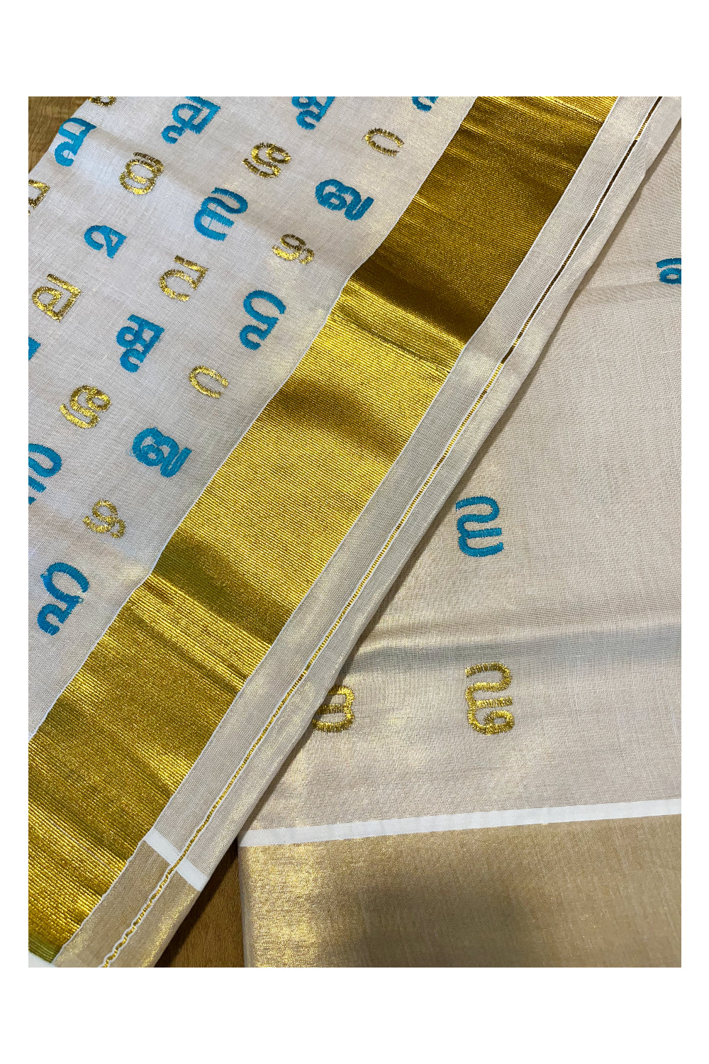 Southloom Kerala Tissue Kasavu Saree with Turquoise and Gold Malayalam Aksharamala Embroidery Work on Body