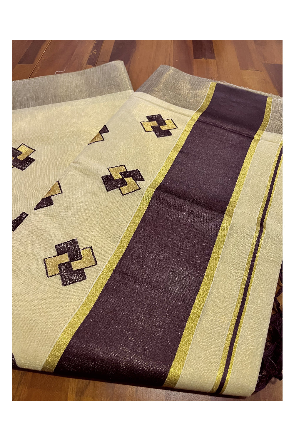 Kerala Tissue Kasavu Saree With Brown Border and Embroidered Designs on Body