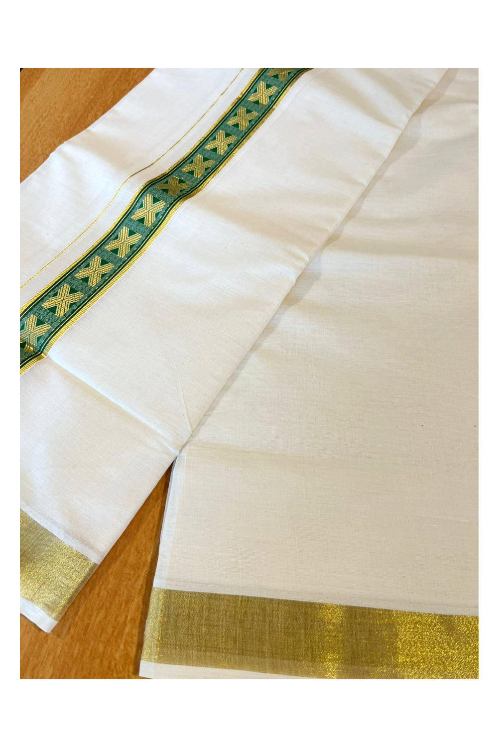 Southloom Kasavu Double Mundu with Green Prints Along Kasavu Kara