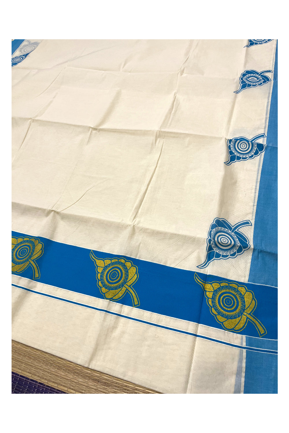 Pure Cotton Kerala Saree with Golden Block Prints on Blue Border and Pallu