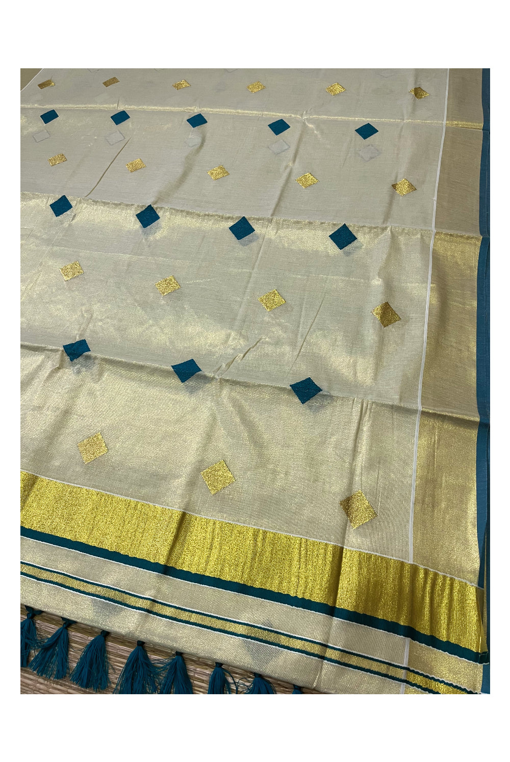 Kerala Tissue Kasavu Saree with Green Woven Butta Designs and Tassels Works