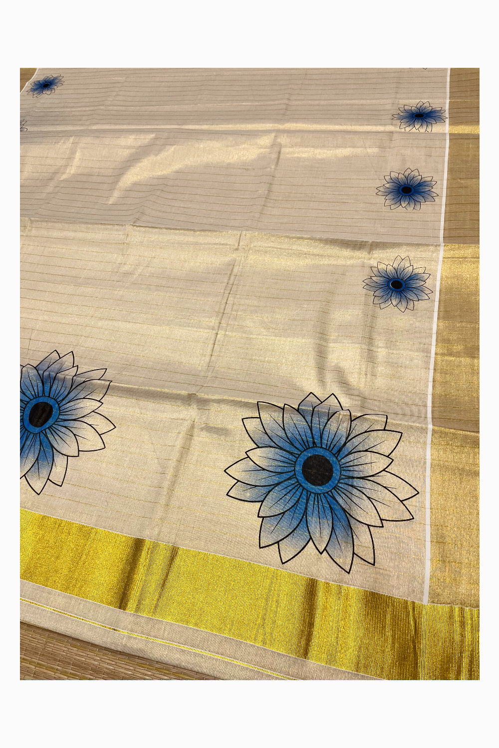 Kerala Tissue Kasavu Lines Design Saree with Blue Floral Prints on Body (Vishu 2024 Collection)