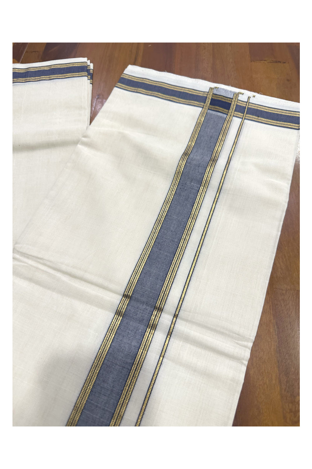 Southloom Premium Handloom Mundu with Dark Blue and Kasavu Kara (Onam Mundu 2023)