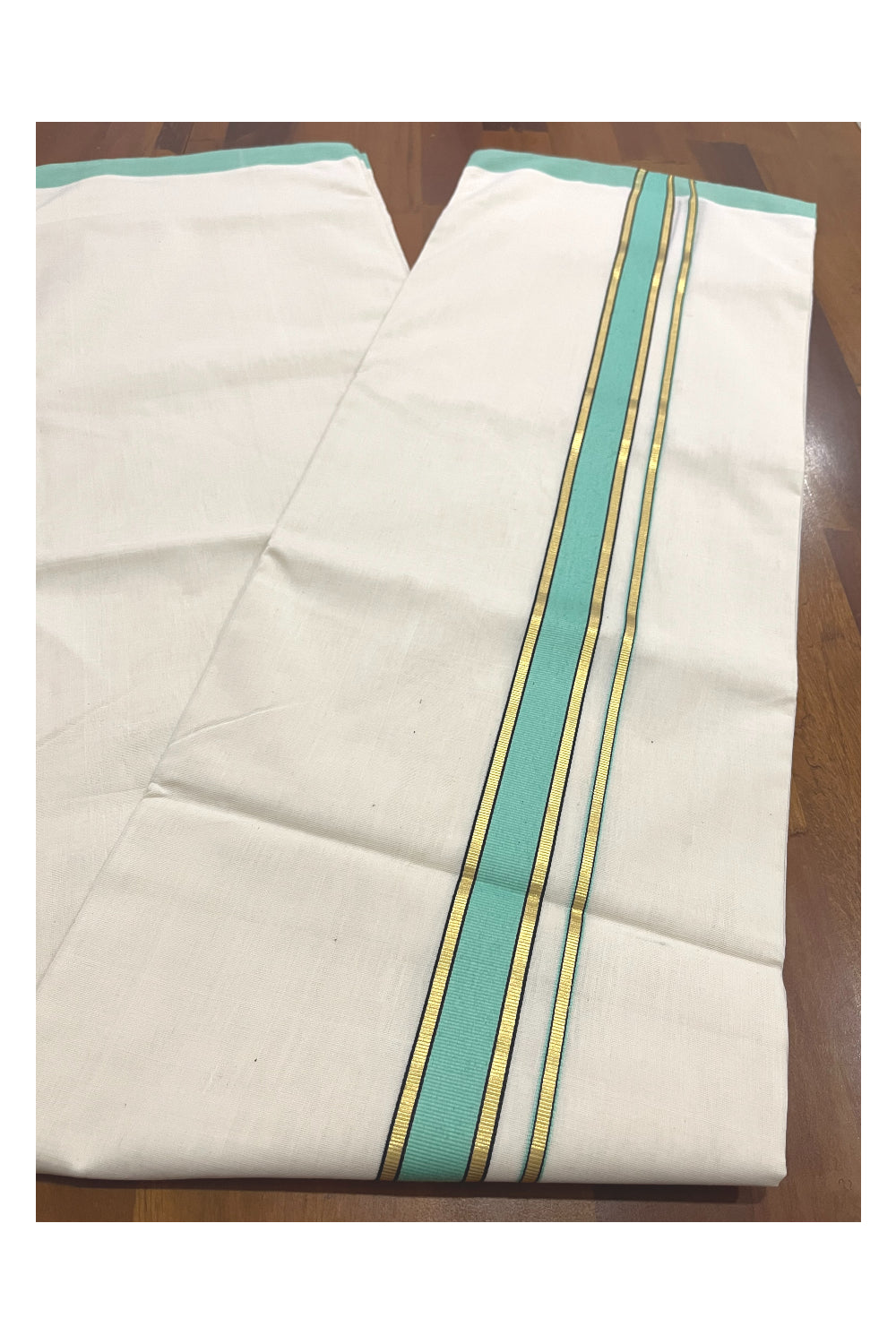 Southloom Premium Balaramapuram Unakkupaavu Handloom Mundu with Light Green and Kasavu Border (South Indian Kerala Dhoti)