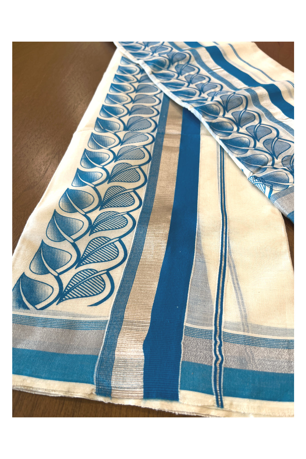 Cotton Single Set Mundu (Mundu Neriyathum) with Block Prints on Silver Kasavu and Blue Border