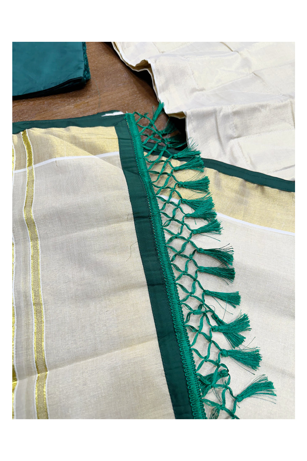 Southloom Semi Stitched Tissue Dhavani Set with Kasavu Lines Design Pavada and Green Blouse Piece