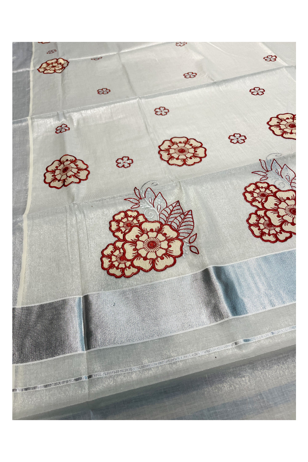 Southloom Kerala Siver Tissue Saree with Red Flower Embroidery Work