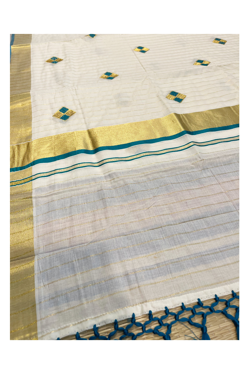 Kerala Cotton Kasavu Lines Saree with Peacock Green and Golden Diagonal Embroidery Work