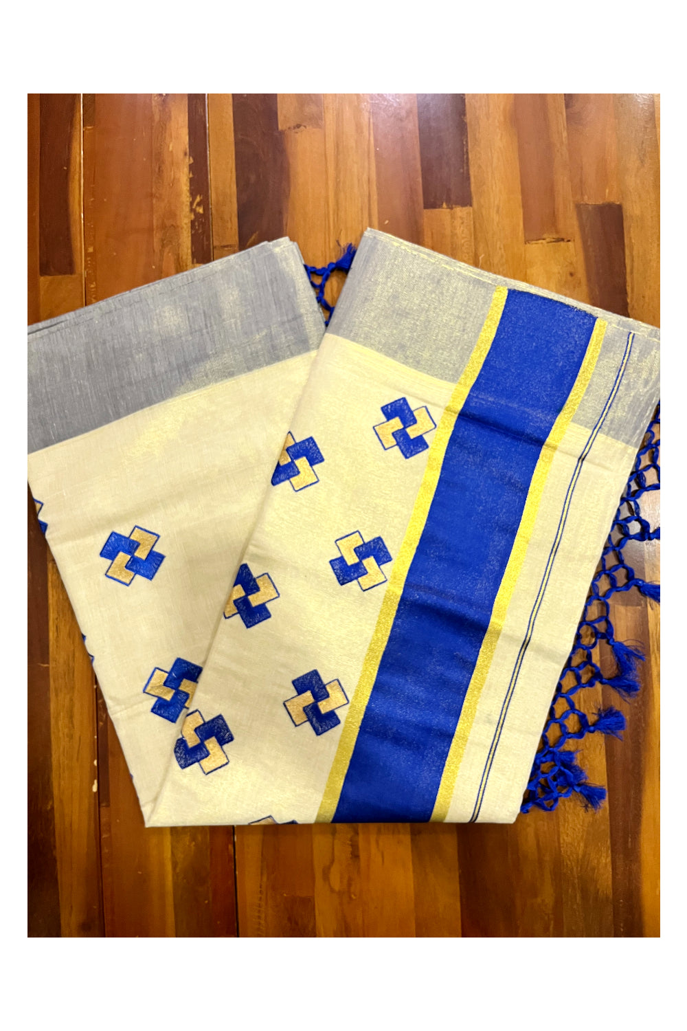 Kerala Tissue Kasavu Saree With Blue Border and Embroidered Designs on Body