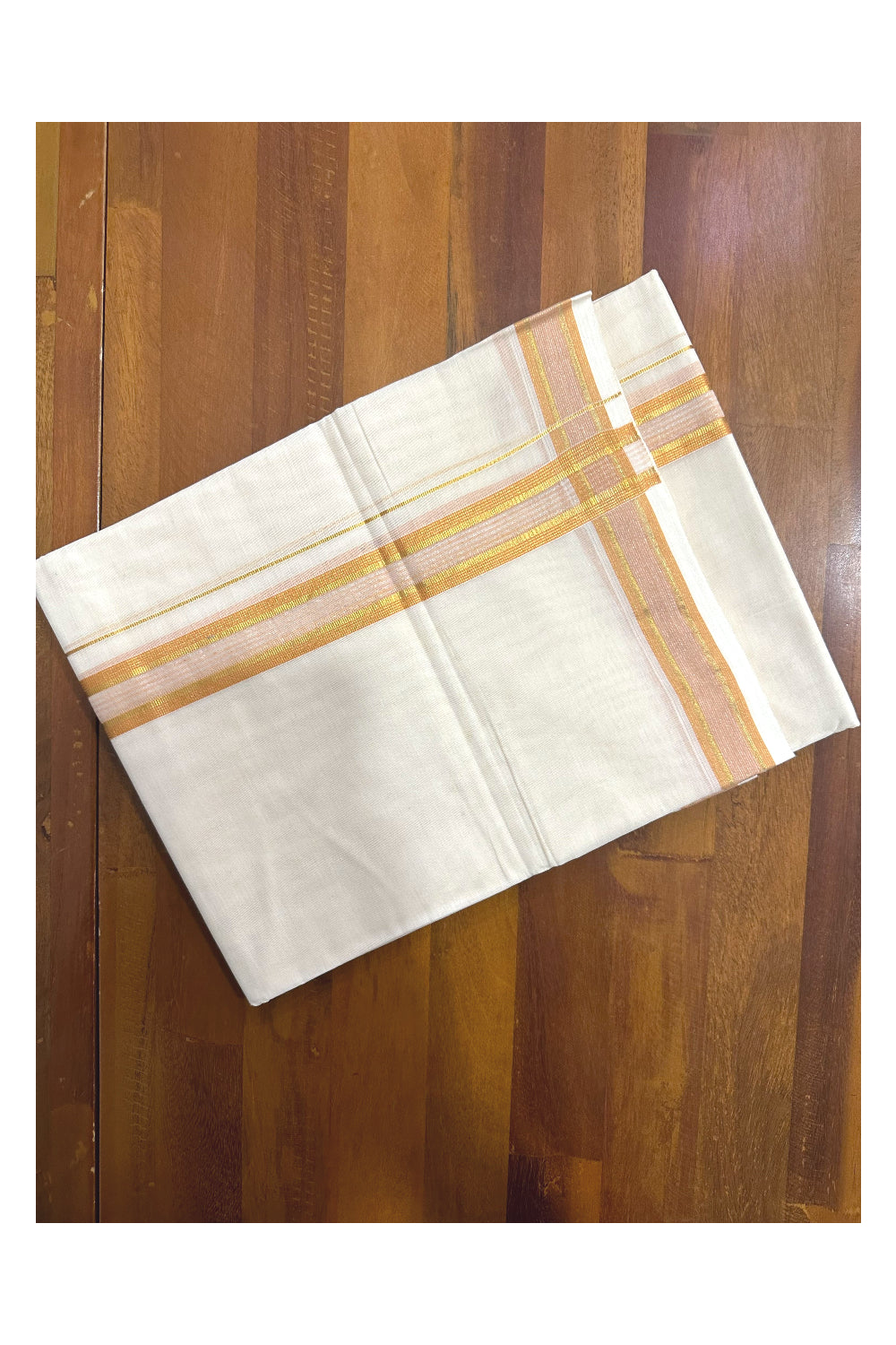 Southloom Premium Handloom Mundu with Orange and Kasavu Kara (Onam Mundu 2023)