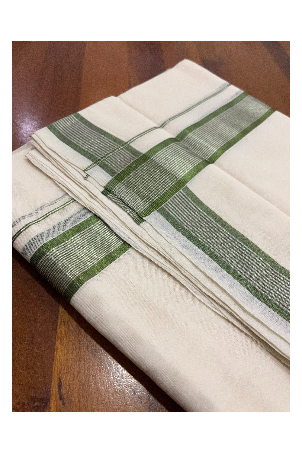 Southloom Premium Handloom Pure Cotton Mundu with Silver and Green Kasavu Border (Onam Mundu 2023)