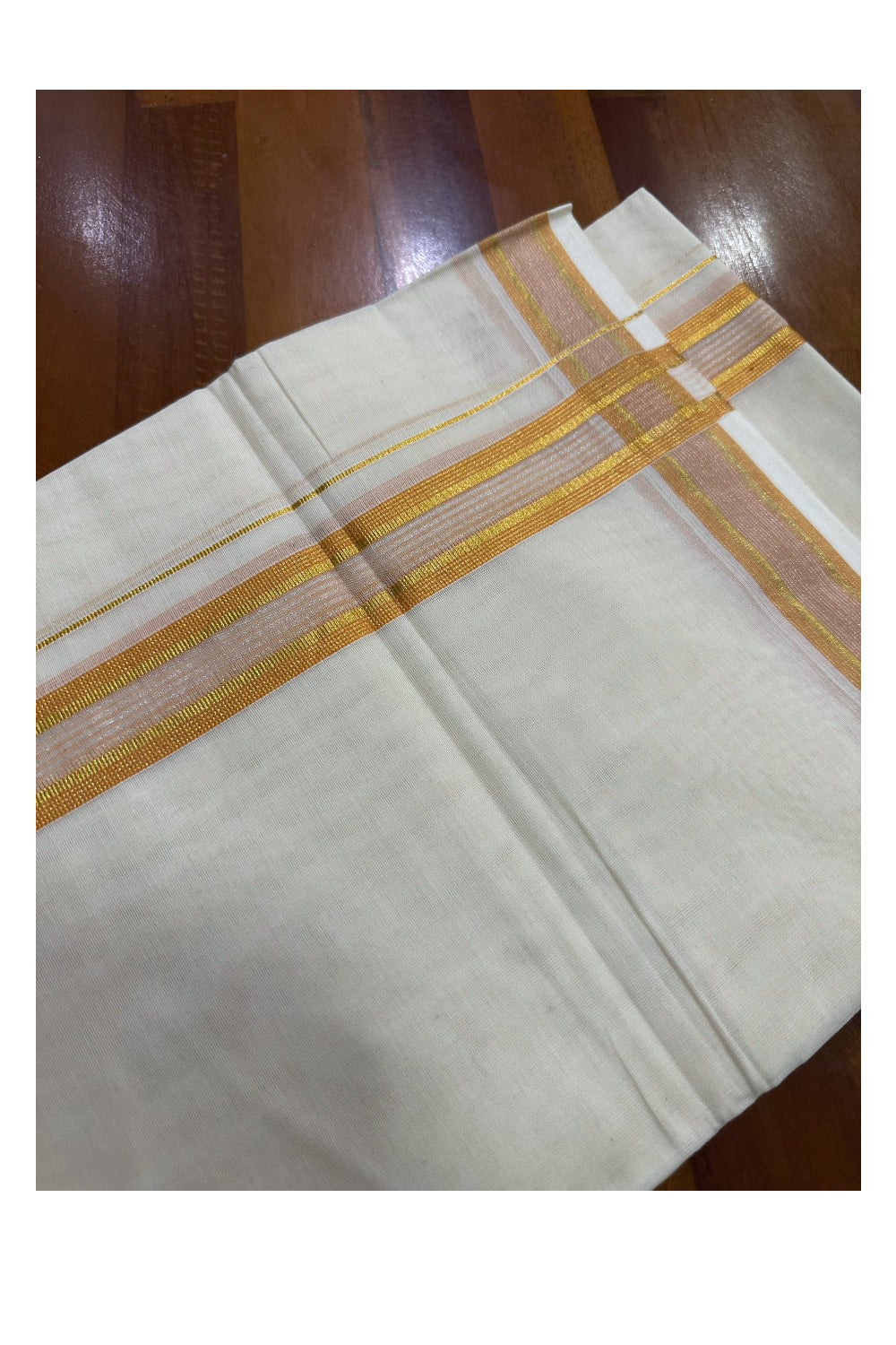 Southloom Premium Handloom Mundu with Orange and Kasavu Kara (Onam Mundu 2023)