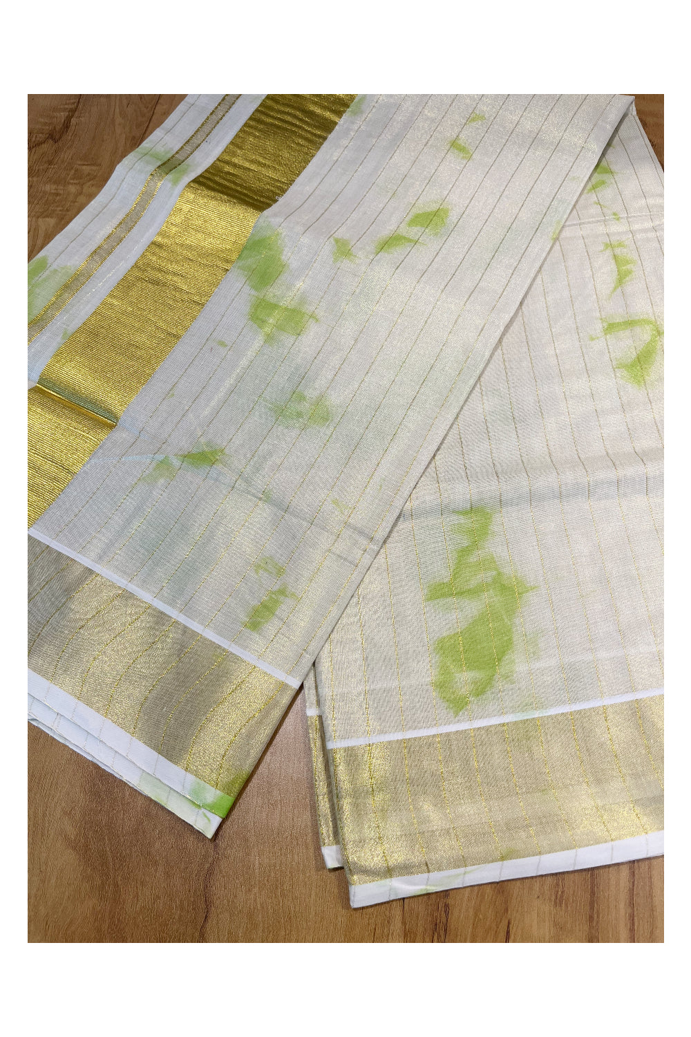 Southloom Tissue Dyed Pattern Green Design Saree with Kasavu Lines Across Body