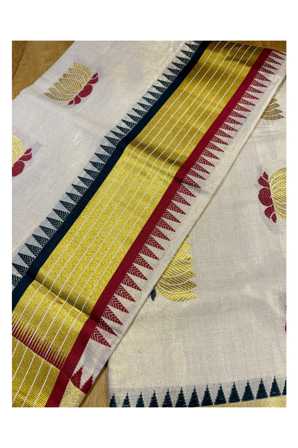 Kerala Tissue Kasavu Saree with Green, Gold and Maroon Lotus Woven Designs