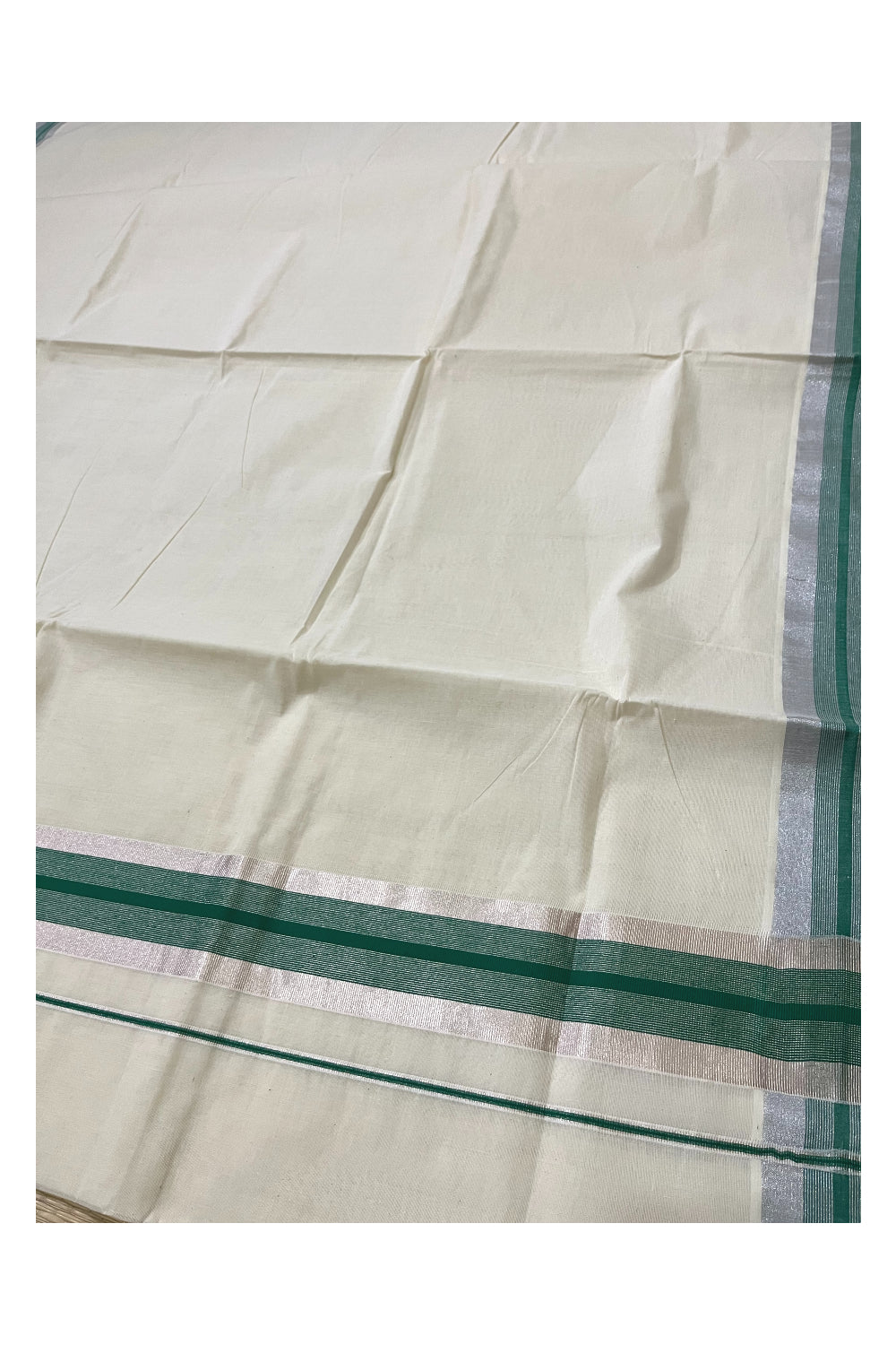 Pure Cotton Kerala Saree with Silver Kasavu and Green Border