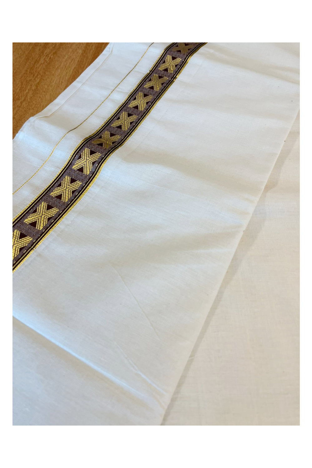 Southloom Kasavu Double Mundu with Brown Prints Along Kasavu Kara