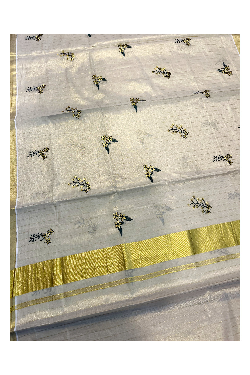 Kerala Tissue Kasavu Lines Saree with Flower Embroidery Works