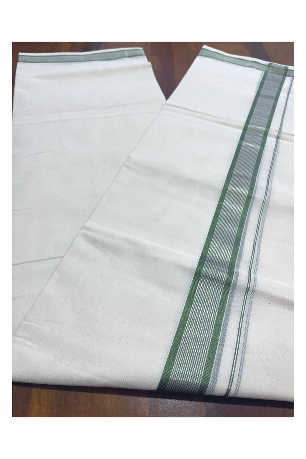 Southloom Premium Handloom Pure Cotton Mundu with Silver and Green Kasavu Border (Onam Mundu 2023)