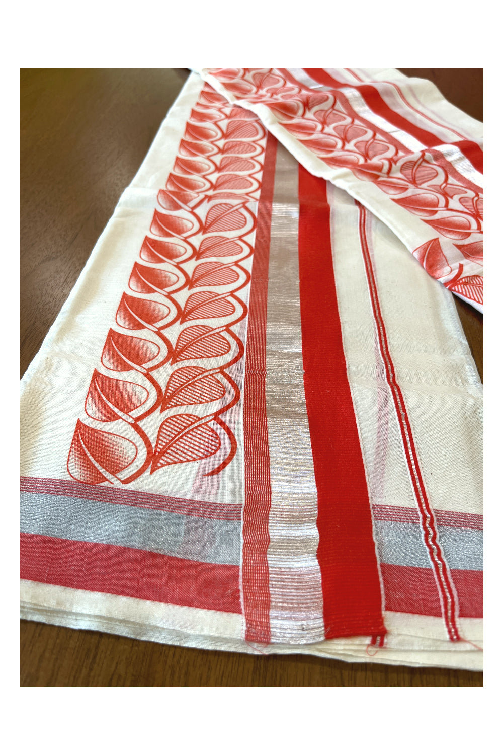 Cotton Single Set Mundu (Mundu Neriyathum) with Block Prints on Silver Kasavu and Orange Border