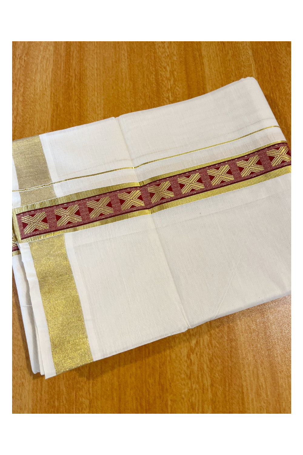 Southloom Kasavu Double Mundu with Maroon Prints Along Kasavu Kara