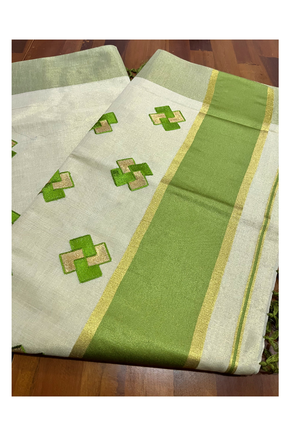 Kerala Tissue Kasavu Saree With Olive Green Border and Embroidered Designs on Body