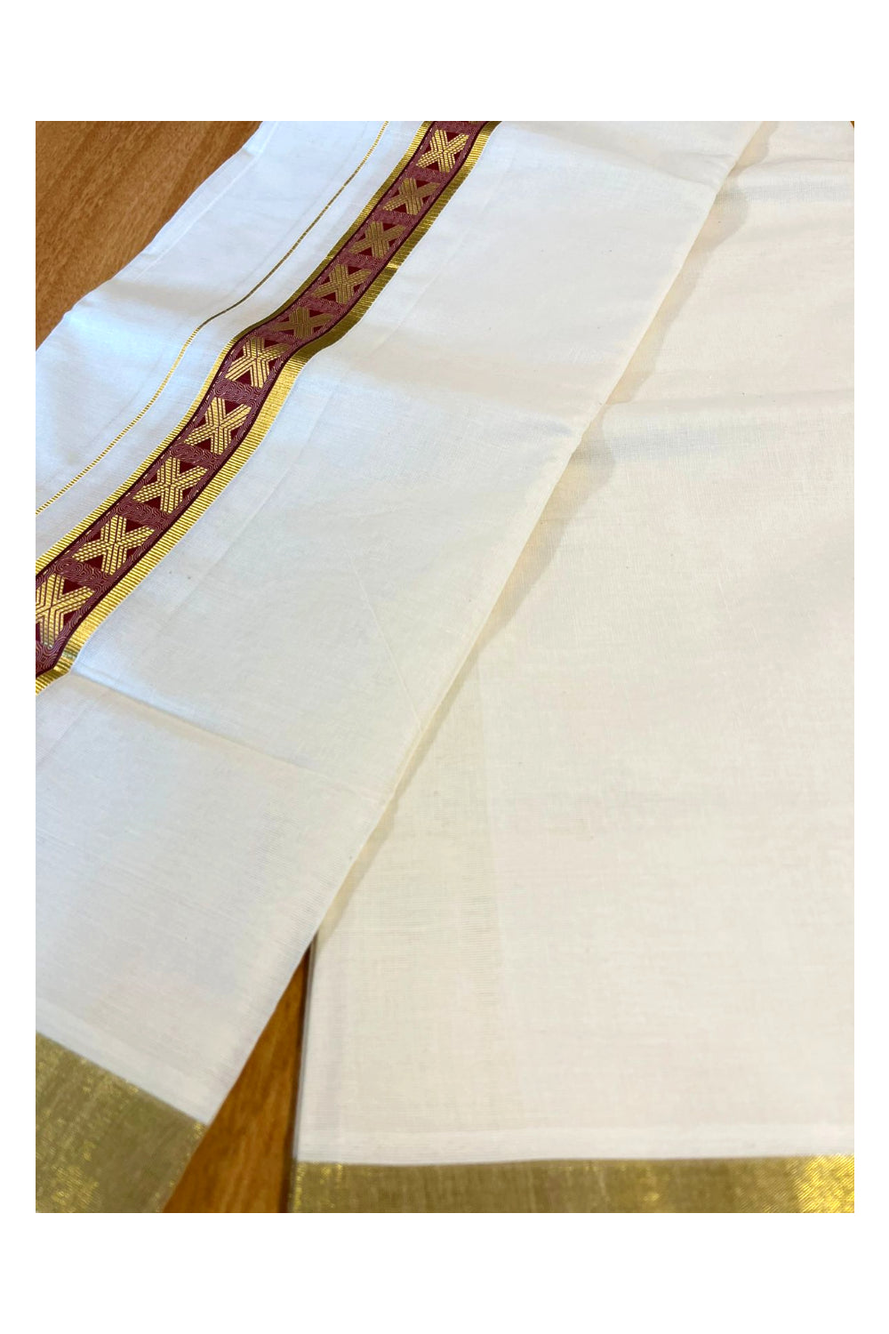 Southloom Kasavu Double Mundu with Maroon Prints Along Kasavu Kara