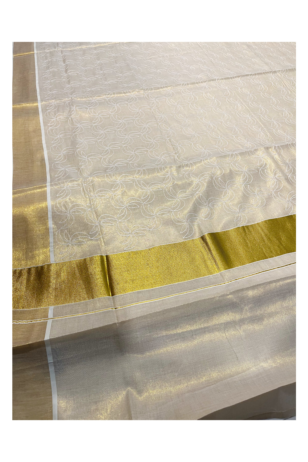 Kerala Tissue Kasavu Saree With White Floral Embroidery Works