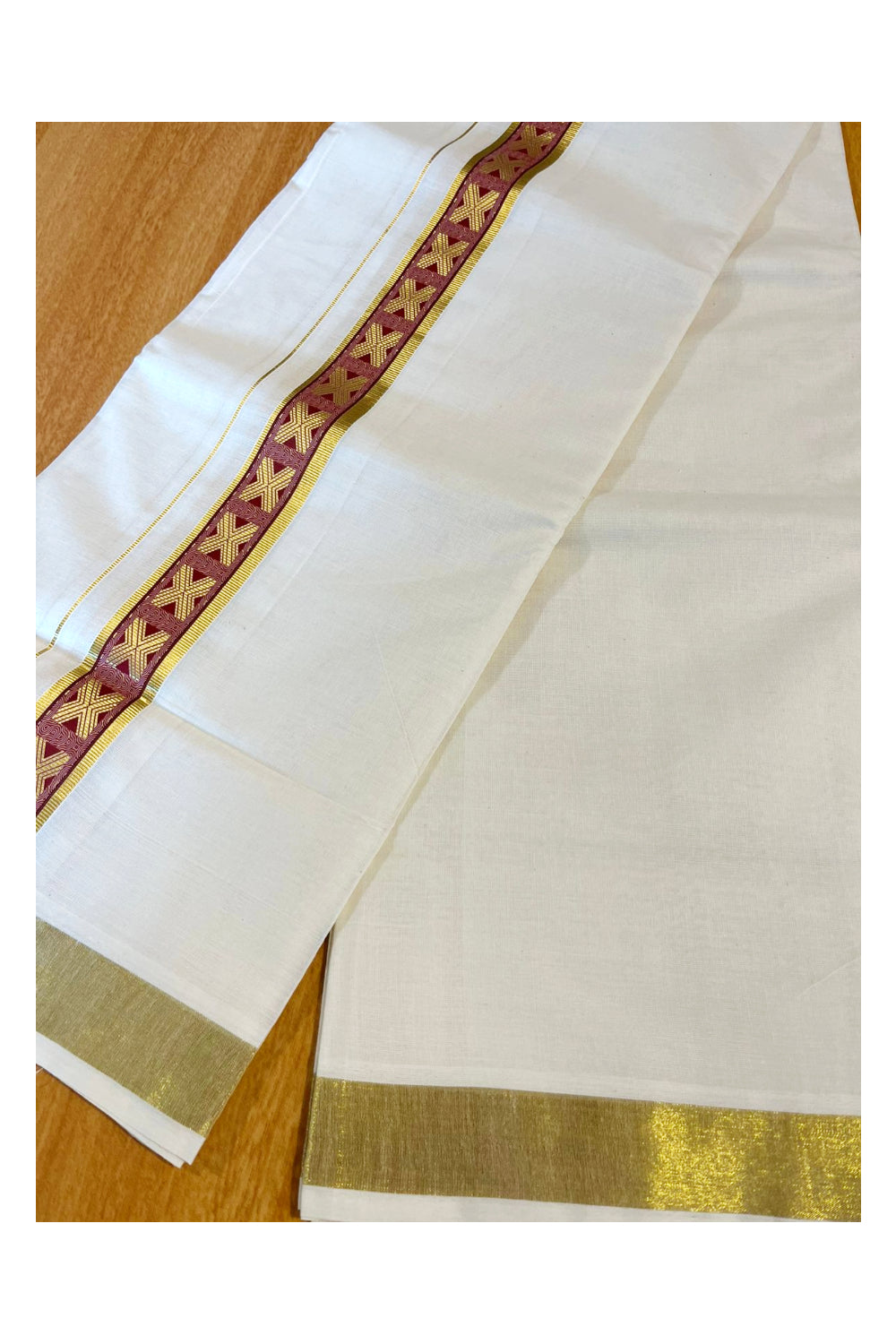 Southloom Kasavu Double Mundu with Maroon Prints Along Kasavu Kara