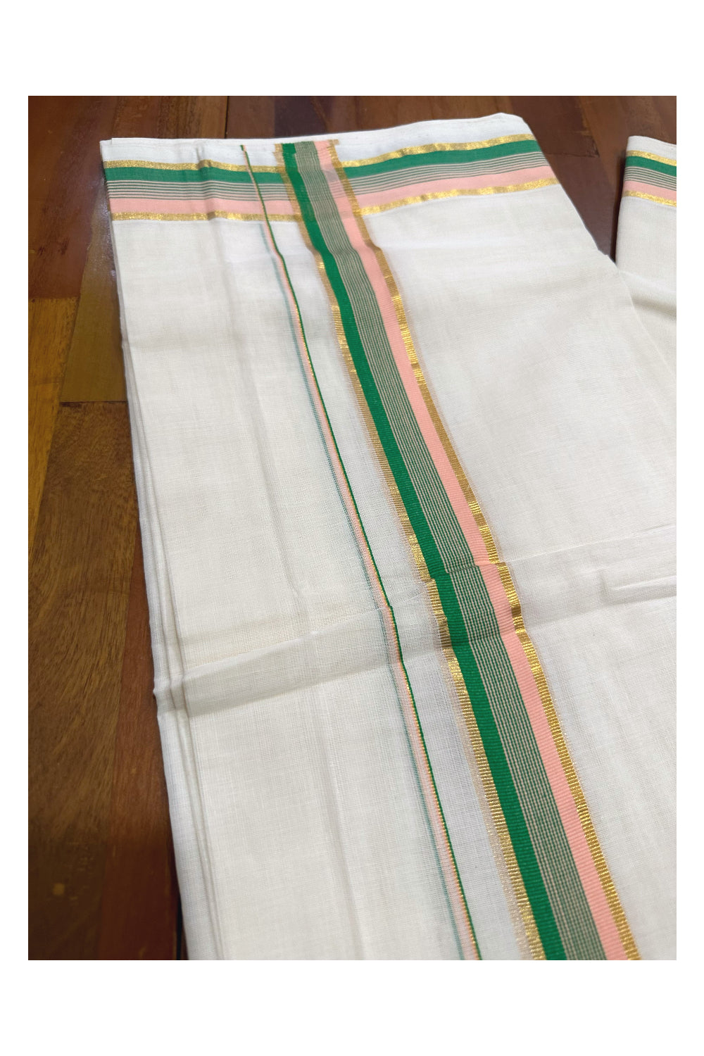 Southloom Premium Handloom Mundu with Green Peach and Kasavu Kara (Onam Mundu 2023)