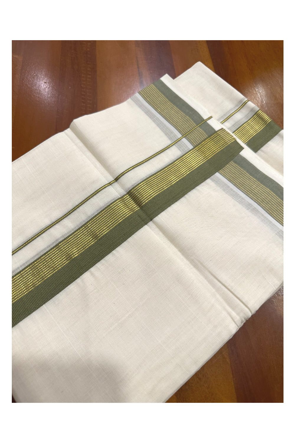 Southloom Premium Handloom Mundu with Green and Kasavu Kara (Onam Mundu 2023)