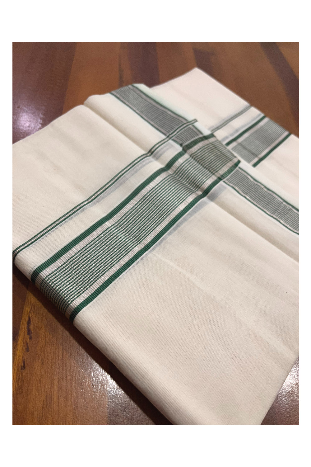 Southloom Premium Handloom Pure Cotton Mundu with Silver and Green Kasavu Border (Onam Mundu 2023)