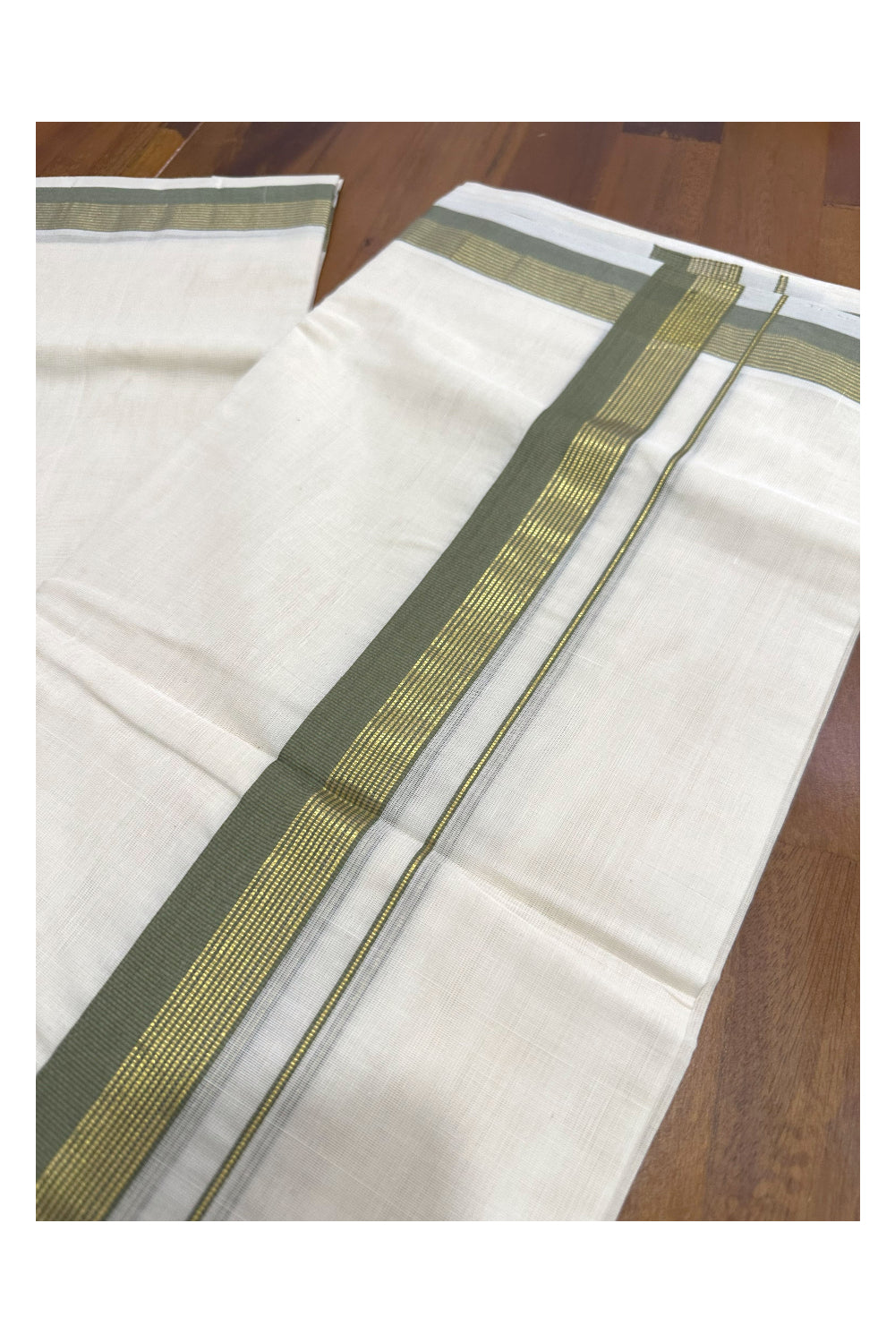 Southloom Premium Handloom Mundu with Green and Kasavu Kara (Onam Mundu 2023)