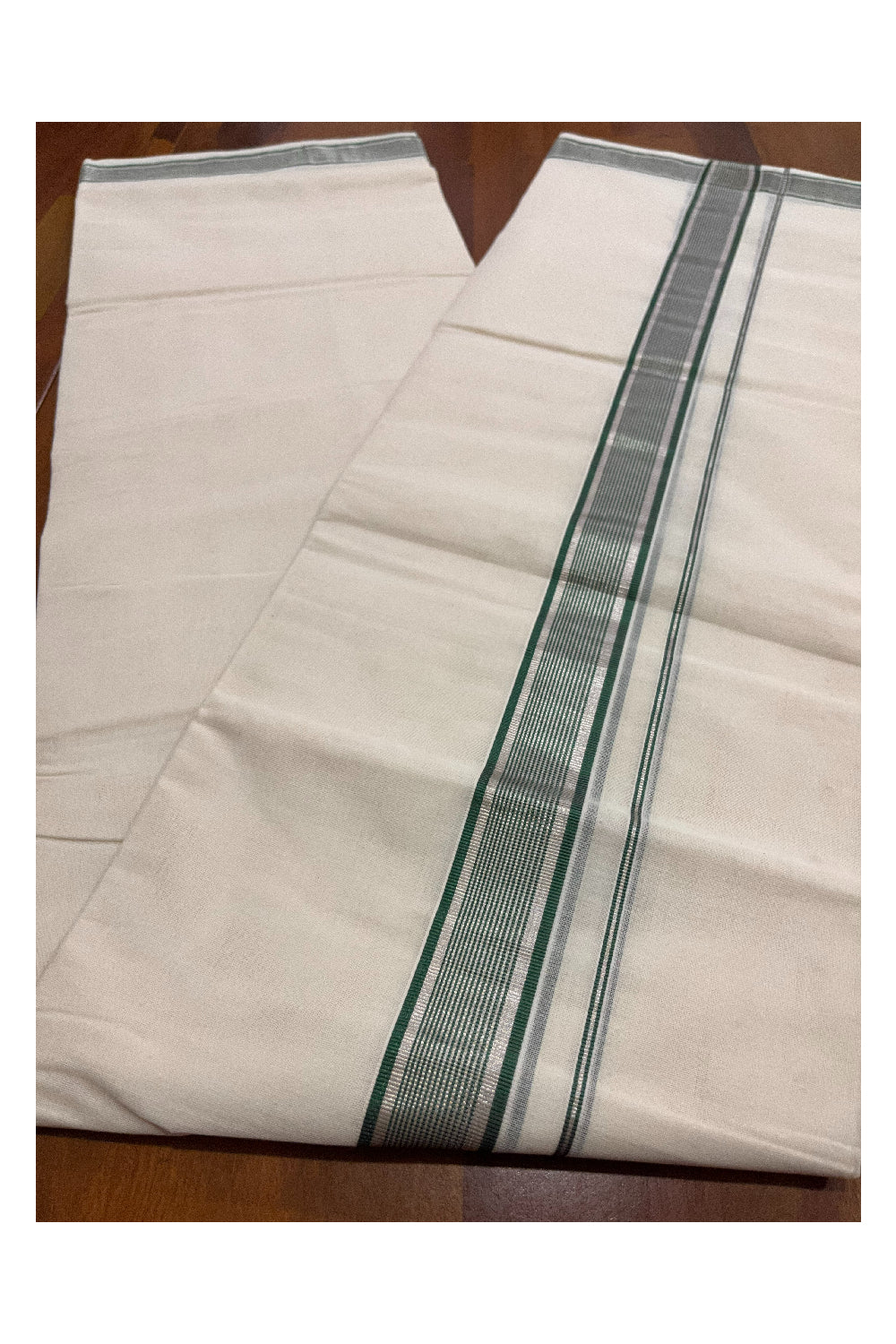 Southloom Premium Handloom Pure Cotton Mundu with Silver and Green Kasavu Border (Onam Mundu 2023)