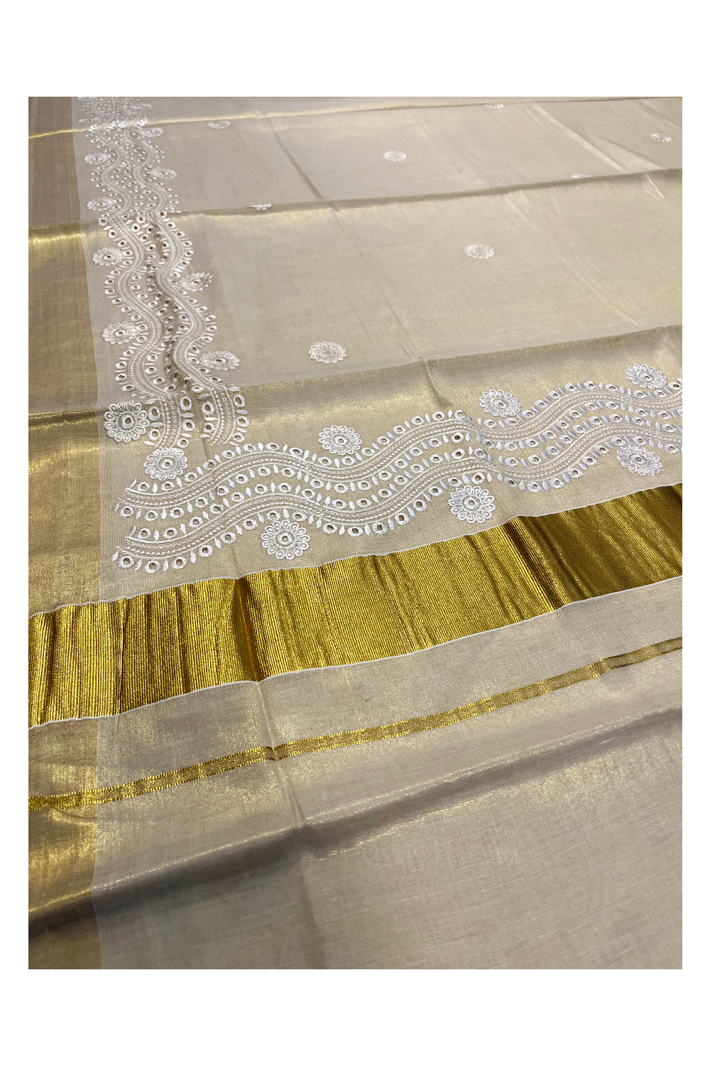 Southloom Tissue Kasavu Saree with Silver Embroidery Work