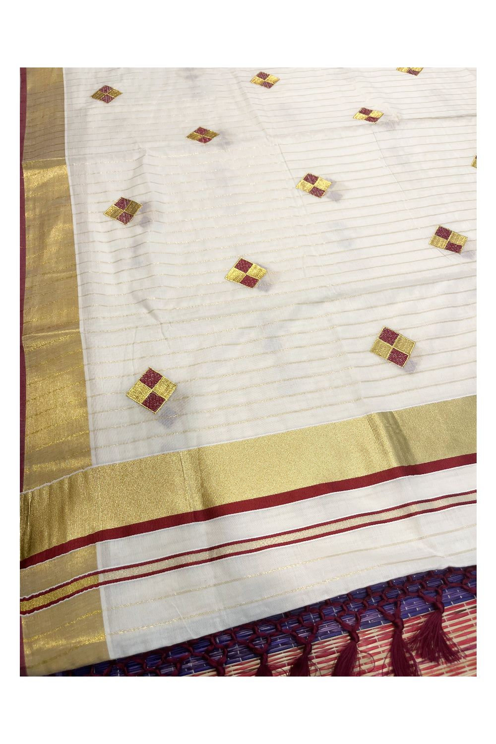 Kerala Cotton Kasavu Lines Saree with Maroon and Golden Diagonal Embroidery Work