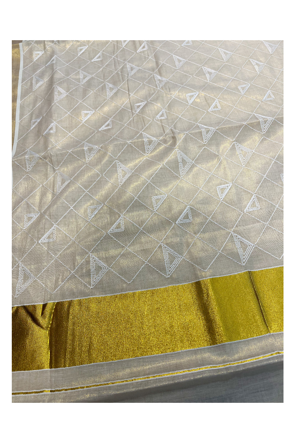 Kerala Tissue Kasavu Saree With White Floral Embroidery Works